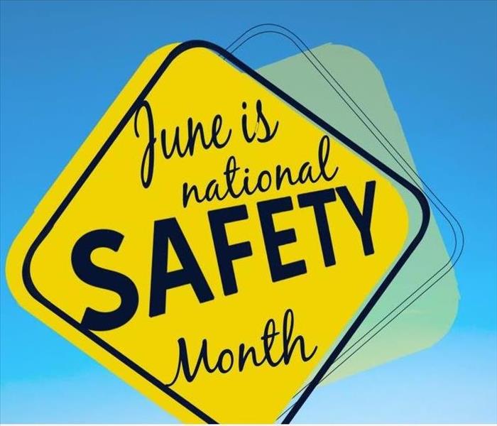 yellow diamond sign that says june is national safety month