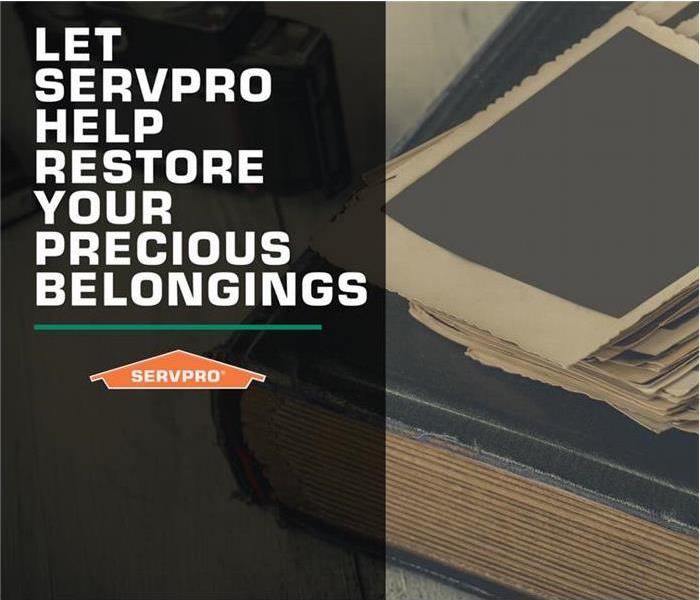 SERVPRO orange house logo with words Let SERVPRO help restore your precious belongings